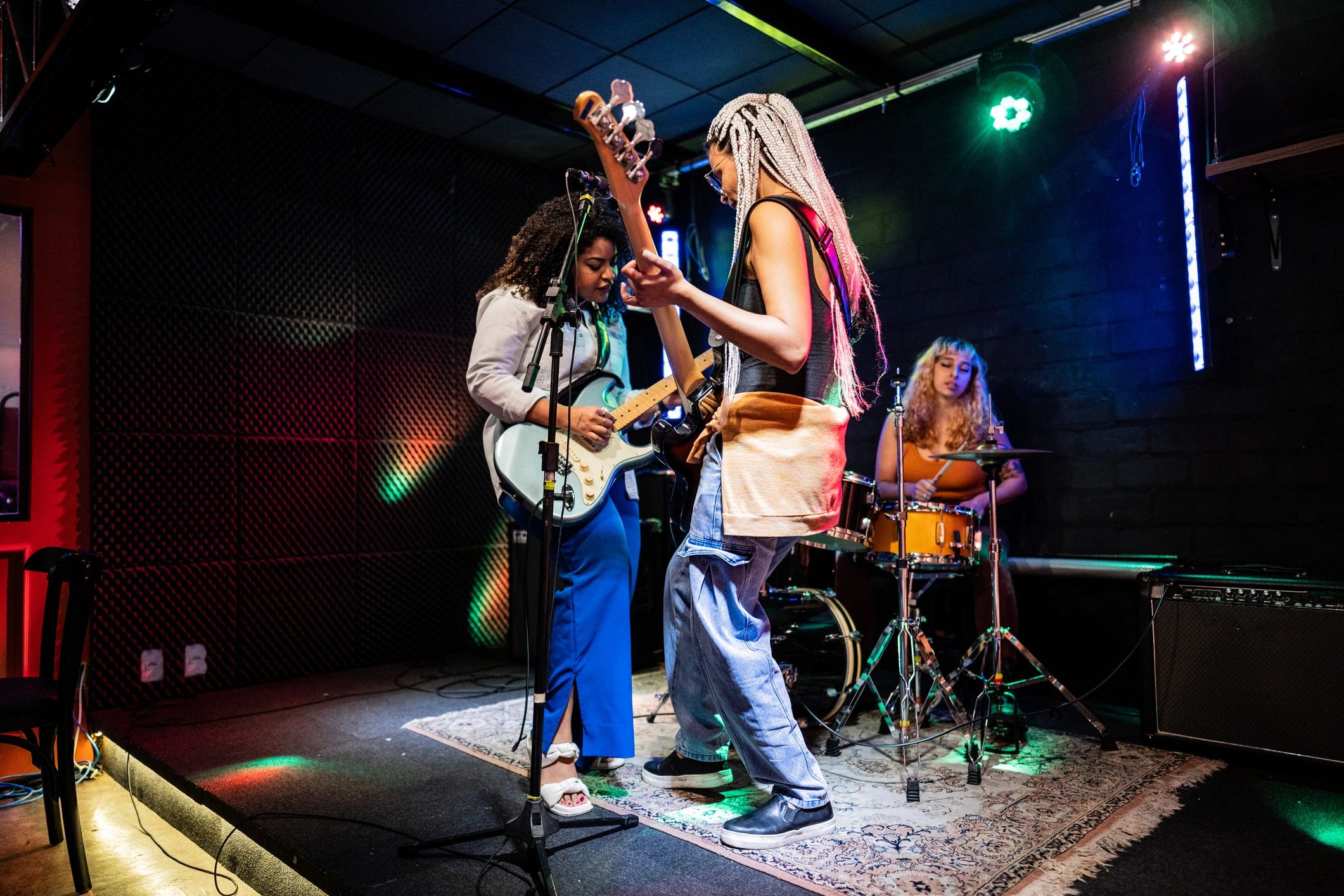 Musicians playing and singing during a show